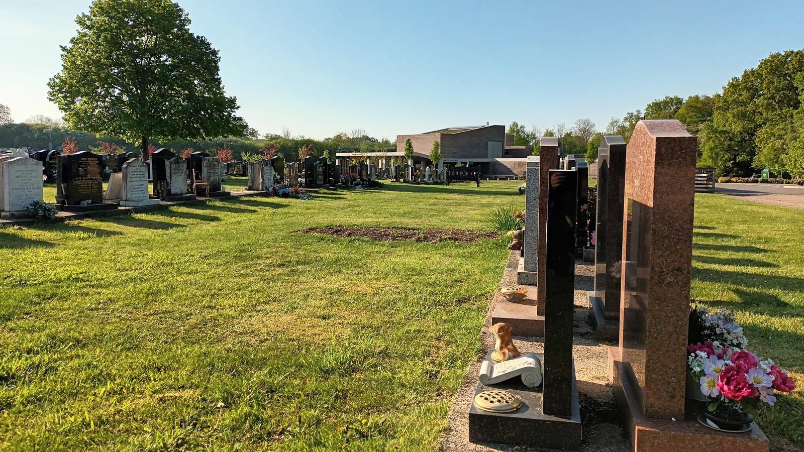 Graves and the Oak Hill building in the background