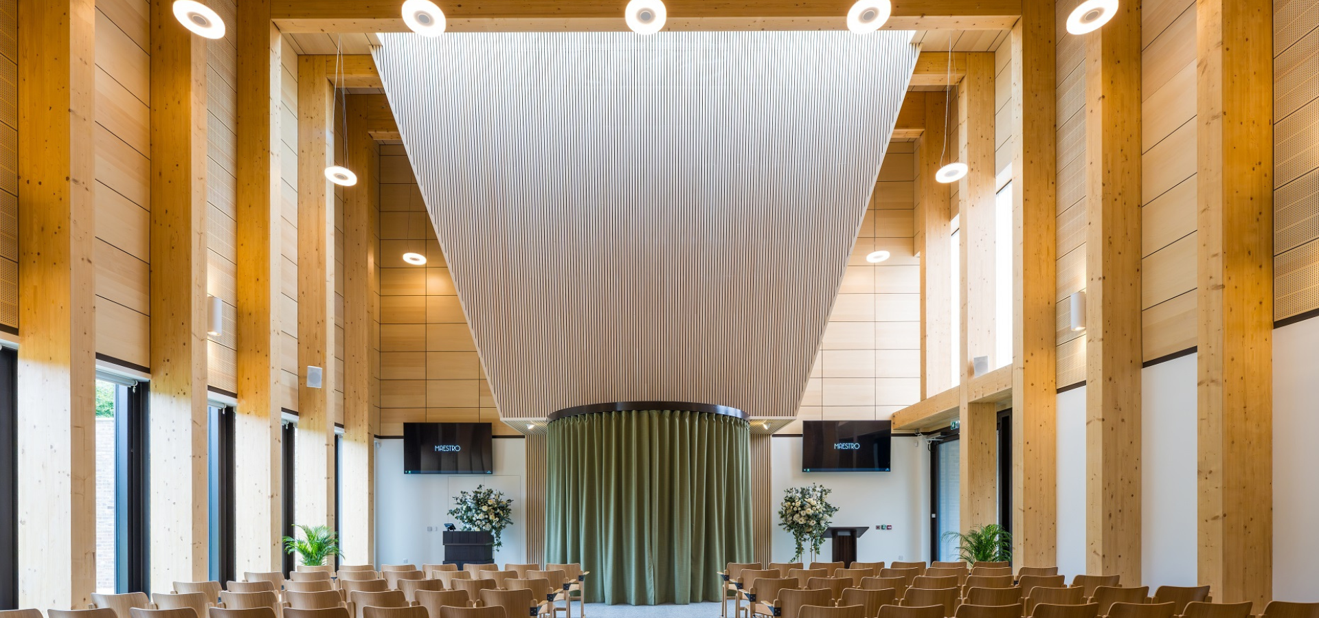 Image of inside of the chapel with the green curtain closed