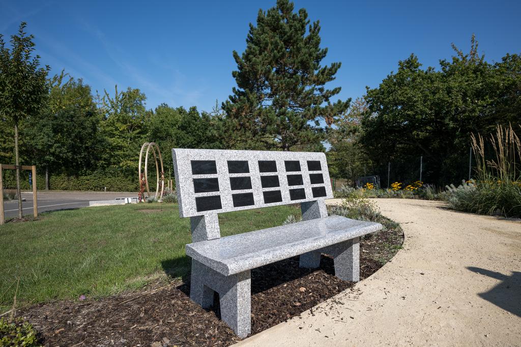 Bench with plaques on it